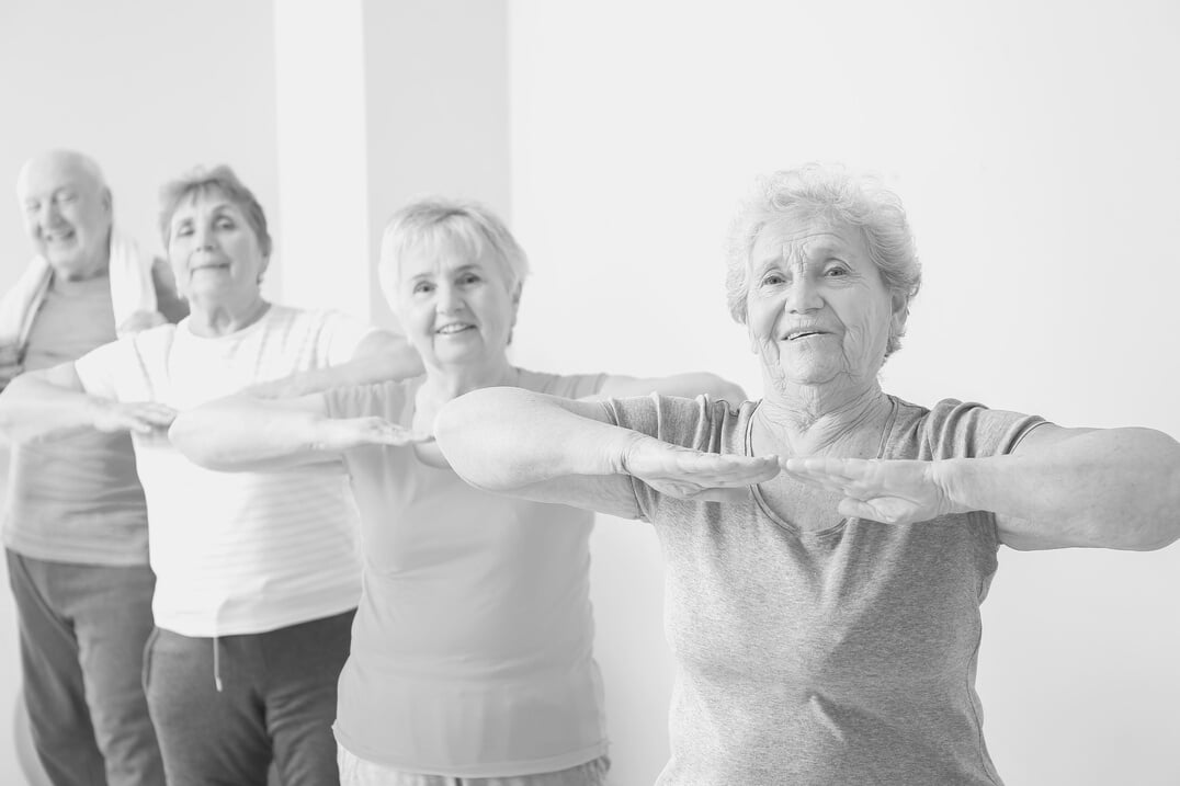 Elderly People Exercising in Gym